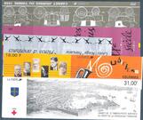 5 enveloppes de carnets de timbres