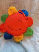 Donne peluche soleil couchant
