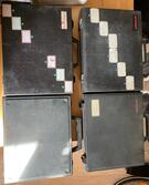 4 valisettes en plastique noir