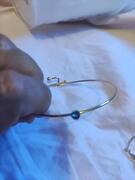 bracelet ajustable avec tout petit coeur bleu