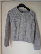 pull gris chiné, torsadé, court