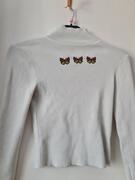 pull avec papillon