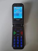 Téléphone mobile à clapet et grosses touches