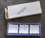 Repose Couverts en porcelaine blanche X 12