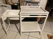 Table à langer avec baignoire