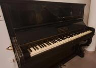 piano droit noir