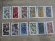 12 timbres oblitérés "Fleurs et Papillons"
