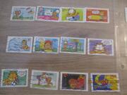 série 12 timbres oblitérés Garfield et 2 bonnes fêtes