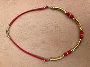 collier rouge et or