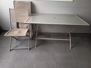 table en verre et 4 chaises de jardin