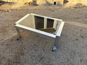 Table basse en métal et verre