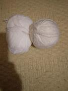 2 restes pelotes de laine blanche