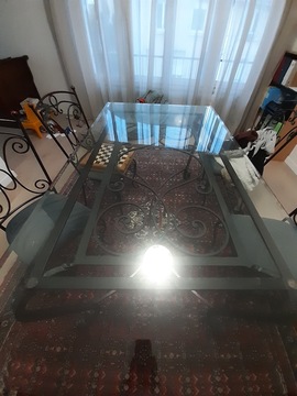 table en verre et fer forgé avec 6 chaises assorties