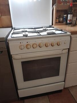 cuisinière gaz + four électrique