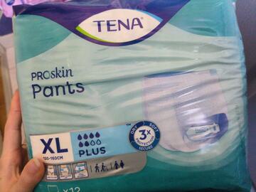 paquet tena pants XL neuf