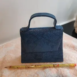 Petit porte monnaie en forme de petit sac