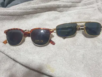 lot 2 lunettes de soleil