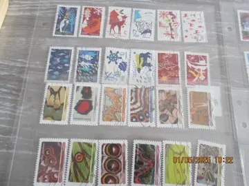 24 timbres oblitérés Noêl/Ailes papillon