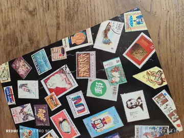 petit album timbres 24/16 cm.. 14 pages