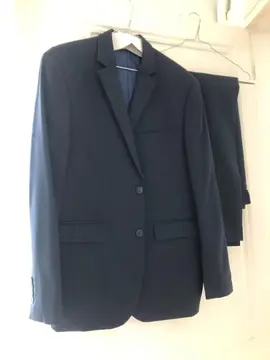 Costume homme bleu foncé en parfait état taille 54 qui sort du pressing