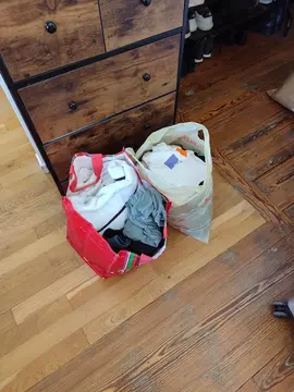2 sacs des vêtements M