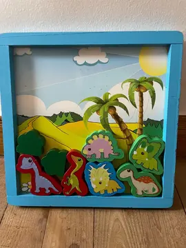 Cadre en bois avec dinosaure