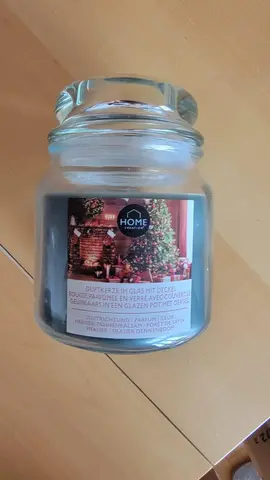 grosse bougie dans un joli pot en verre