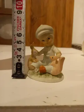 figurine enfant lapin écureuil en ceramique