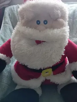 Donne peluche père Noël