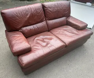 2 fauteuils de 2 places en cuir