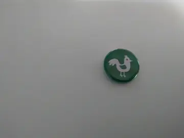 pince Vert avec un coque blanc