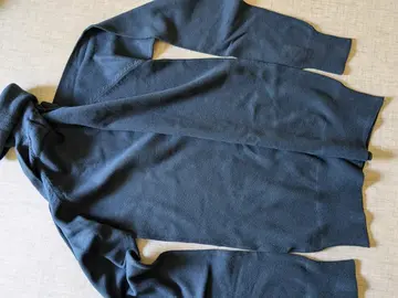 pull vert col roulé