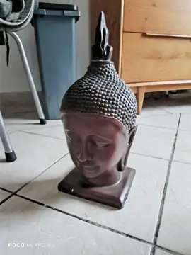 tête de Bouddha en résine marron