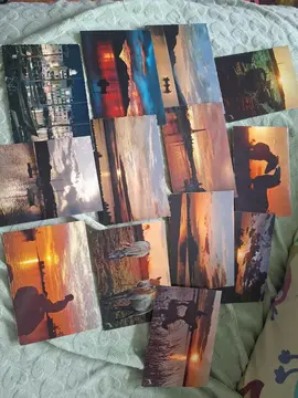 Cartes postales couchés de soleil écrites au dos
