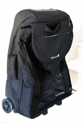 Valise sac à dos Lafuma avec roulettes (dont une est à réattacher)