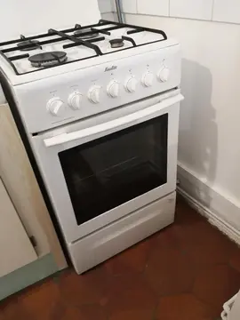 Donne cuisinière mixe gazetfoet four électrique