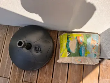 pied de parasol et sac de sable 15 kilos neuf