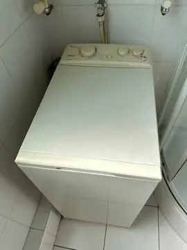 Lave linge Whirlpool chargement par le haut
