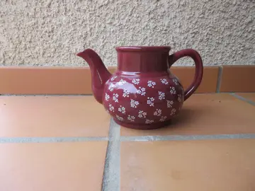 théière accidentée pour bouquet ....