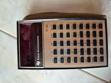 ancienne calculatrice textas