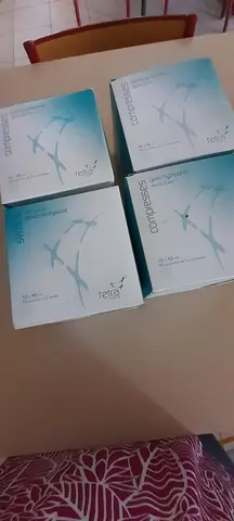 4 boîtes de 50 compresses