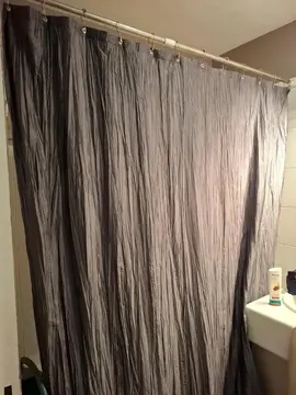 Barre extensible et rideau de douche