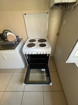 cuisinière en parfait état qui fonctionne