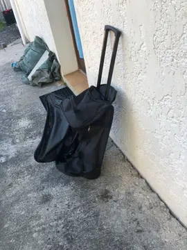 Sac voyage avec poignée rétractable et roulettes