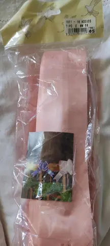 Paquet de 10 noeuds rose formant une "fleur"