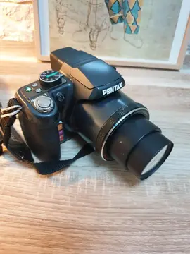 Appareil photo "Pentax" avec house . grossissement X 26