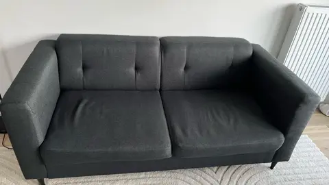 Canapé gris scandinave acheté en 2022