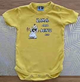body bébé 6 mois comme neuf
