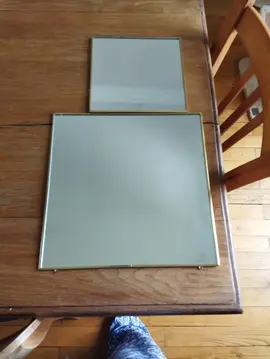 2 miroirs avec encadrement dorure