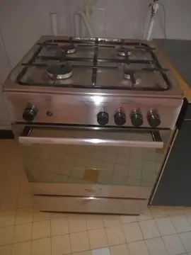 Cuisinière gaz de ville 4 feux Ariston Hot Point